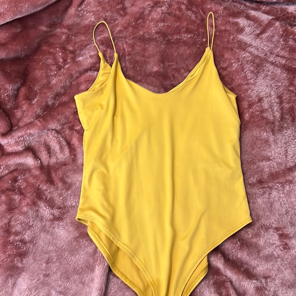 Yellow bodysuit